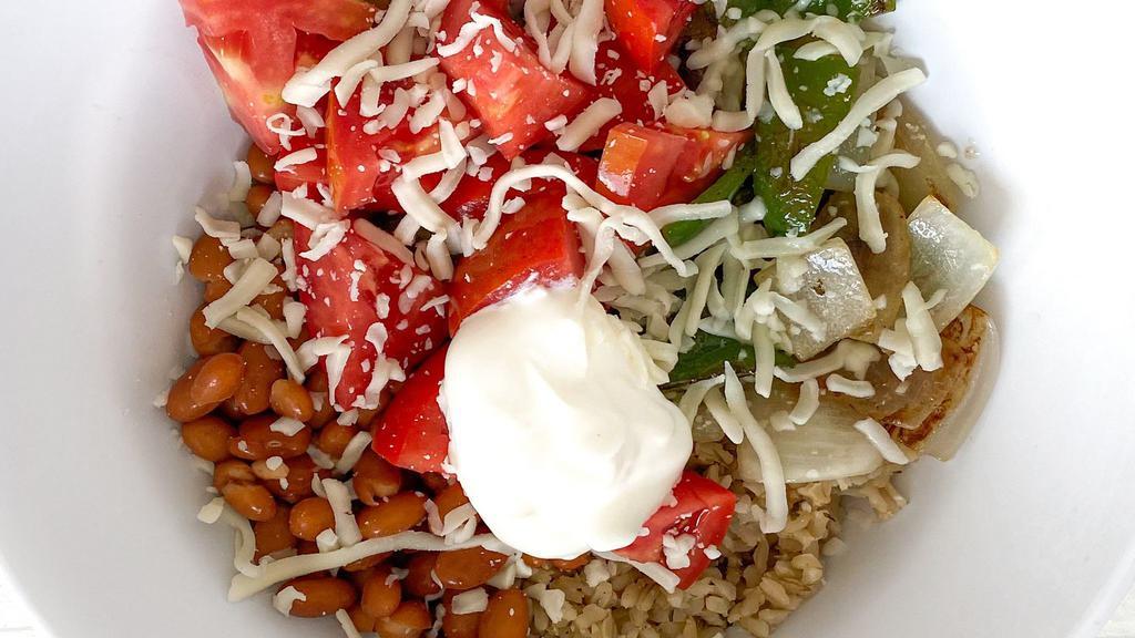 Fajita Bowl · Brown rice, pinto beans, grilled onions, grilled peppers, tomatoes, mozzarella, cheese, and sour cream.