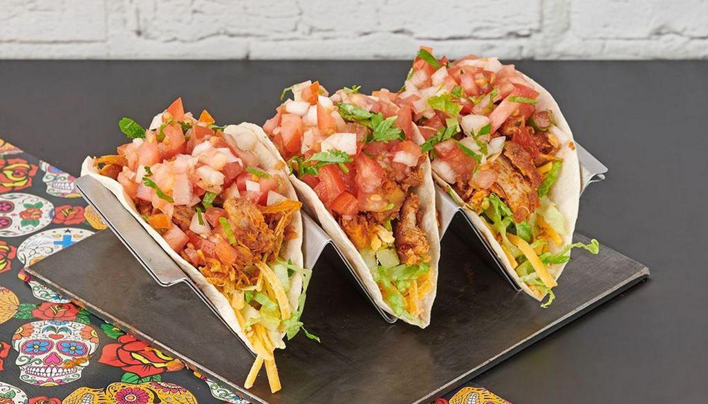 Pork Carnitas Tacos · 3 tacos with pulled pork, shredded cheese, lettuce, pico de gallo and your choice of sauce.