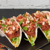 Pulled Beef Barbacoa Tacos · 3 tacos with pulled beef barbacoa, shredded cheese, lettuce, pico de gallo and your choice o...