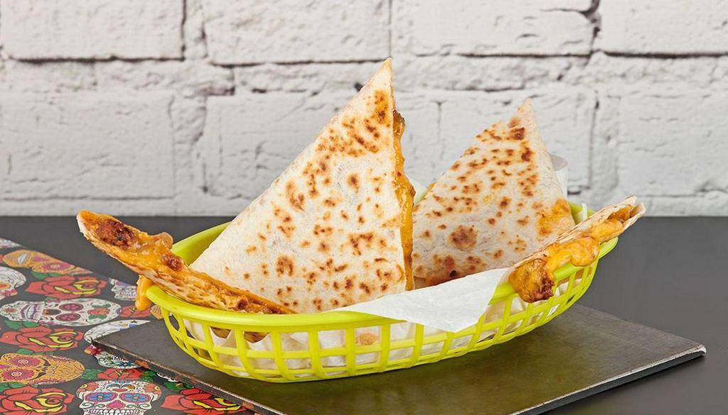 Beyond Meat Quesadilla · Plant-based Beyond Meat with shredded cheese, queso, and your choice of sauce.