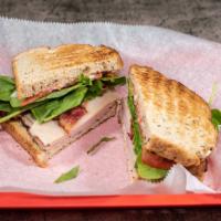 Chubby Clubby · Turkey, ham, bacon, tomato, lettuce, and mayo on toasted bread of your choice.
