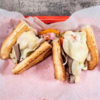 Philly · Roast Beef, onions, grilled peppers and provolone cheese served on a warm toasted sub roll.
