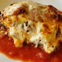 Lasagna Bolognese · Homemade Layered Pasta with Bolognese Sauce (Beef) Ricotta, Parmesan and Mozzarella Cheese.