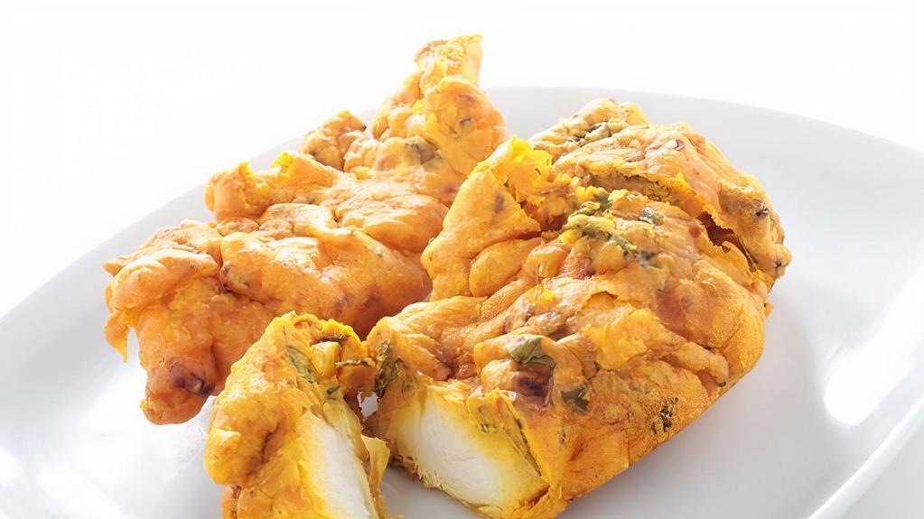 Chicken Pakora · Tender chicken fillets lightly battered and fried golden brown.