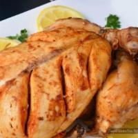 Chicken Charga · Twice cooked whole chicken marinated with secret spices.