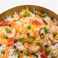 Veg Biryani · Long grain basmati rice cooked with vegetables to perfection over a low flame. Garnished wit...