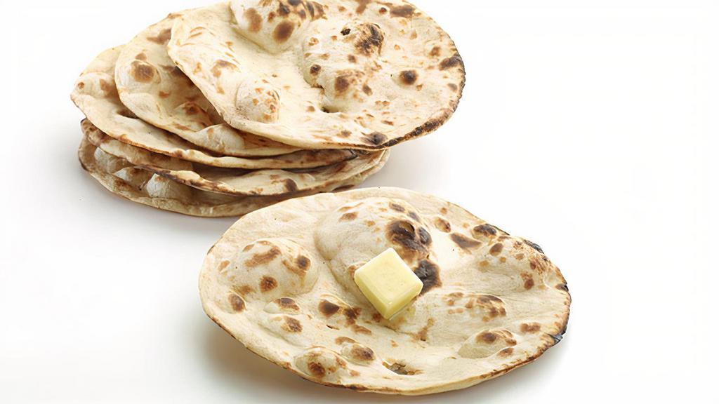 Tandoori Roti · Oven fresh baked plain bread.