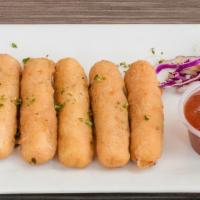 Mozzarella Sticks · Fried mozzarella.