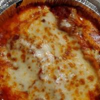 Manicotti · Homemade marinara with ricotta, mozzarella and parmesan cheese. With a side of garlic roll.