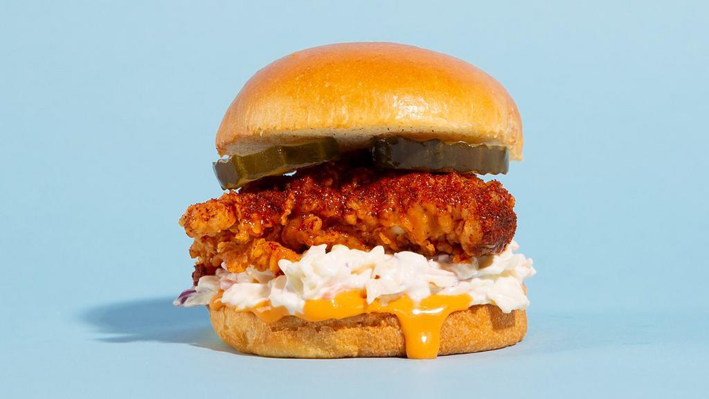 Nashville Hot Fried Chicken Sandwich · Buttermilk fried and served on a brioche bun with pickles, cole slaw, house spicy sauce. Served with fries.