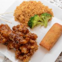 Sesame Chicken Combination Plate · Served with an egg roll and your choice of side.