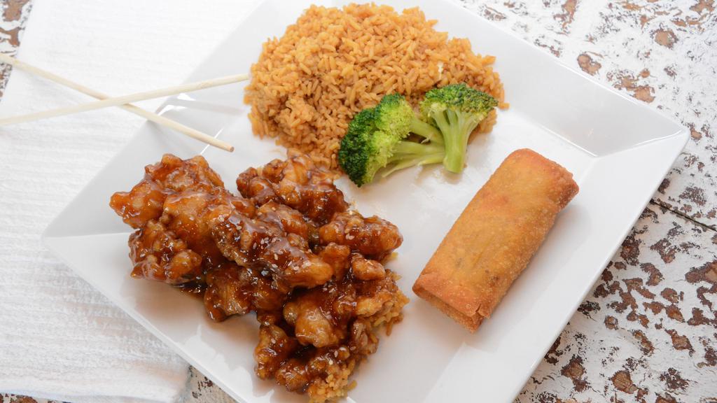 Sesame Chicken · Lightly battered chicken deep fried with special sweet brown sauce topped with sesame.