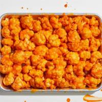 Large Cauliflower Bites · Florets of cauliflower battered and fried, covered with your choice of sauce. Served with ce...