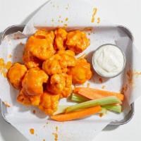Small Cauliflower Bites · Florets of cauliflower battered and fried, covered with your choice of sauce. Served with ce...