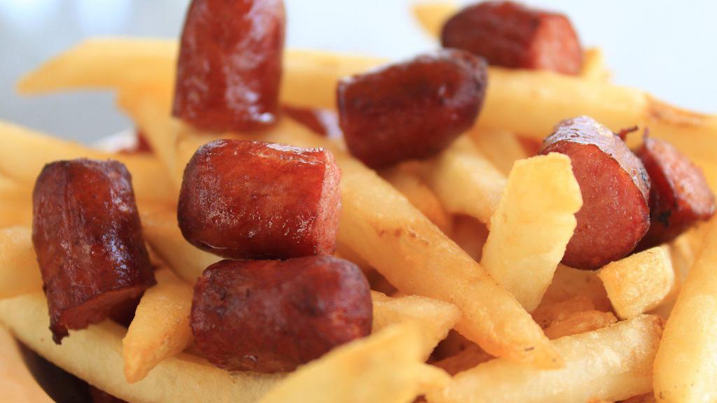 Small Choripapa · Chorizo Colombiano y papas fritas / Chopped Colombian sausage and fries.