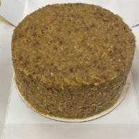 German Chocolate Whole Cake · A custard -like frosting containing pecans and coconut is spread on chocolate cake layers.