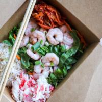 Braves · Shrimp, green onion, lettuce, cilantro, edamame, crabmeat salad, and kimchi with ponzu fresh.