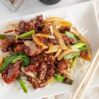 Mongolian Beef · Served with chips fried rice crab rangoon spring roll and choice of wonton egg drop or hot a...