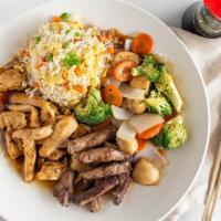 Hibachi Lunch Steak · Served with salad and steamed rice. Substitute Japanese fried rice for additional charge. * ...