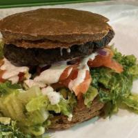 Juicy Burger · Mushroom vegan burger made with mushrooms and garbanzo beans, quinoa. Toppings include lettu...