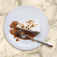 Turtle Cheesecake · An ultra-rich cheesecake topped with caramel, chocolate and pecans.
