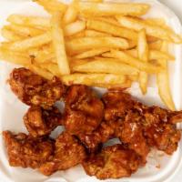 Boneless Wings - 6 Pieces · Served with fries.