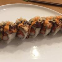 Georgia Roll (8) · Spicy tuna, crab, avocado, topped with eel & spicy crunch.