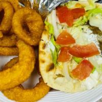 Gyro Traditional · Comes with red onion lettuce tomato and tzatziki sauce.