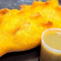 Curry Chicken Empanada (1) · A Caribbean twist on the traditional Colombian empanada. It's filled with Jamaican curry chi...