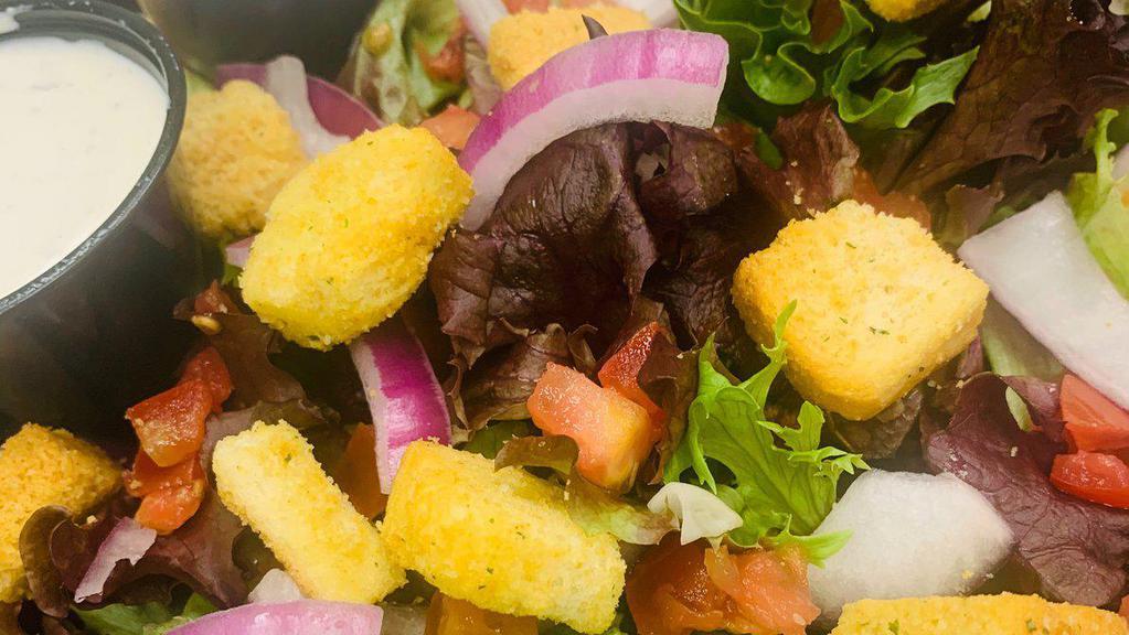 House Salad · Salads include lettuce, tomato, cucumber, eggs, cheddar cheese, and croutons, plus dressing of your choice.