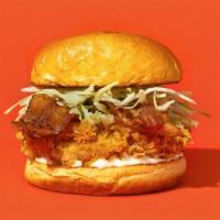 Bacon Ranch · Our signature fried chicken served on a toasted bun and topped with crispy bacon, shredded c...