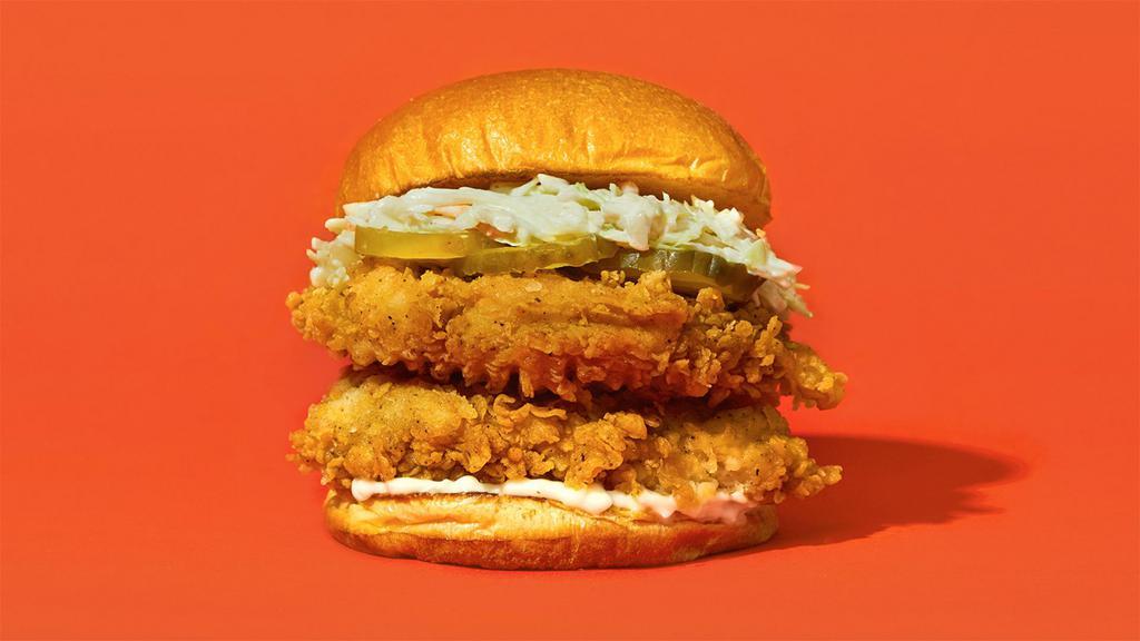 Double Stack · Two pieces of our signature fried chicken served on a toasted bun and topped with coleslaw, pickles, and mayonnaise.