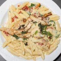 Braves Penne · Sundried tomatoes, spinach, parmigiana in a garlic and herb sauce.