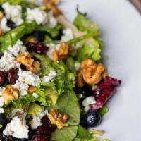 Shrimp Berries & Gorgonzola Salad · Mixed Greens, Tossed in a Strawberry Vinaigrette with Grilled Shrimp, Dried Cranberries, Fre...