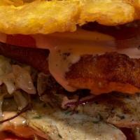 Chimi Ta De Too · El dominicano de verdad. Carne regular de hamburguesa, queso frito, tocino, maduro y nuestro...