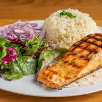 Salmon · Grilled marinated salmons. Served with rice and salad.