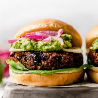 The Ultimate Black Bean Burger · This is a succulent plant based burger made with a  black bean patty then topped with lettuc...