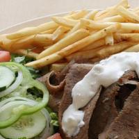 Gyro Platter · Lamb or chicken. Gyro meat, tomato, lettuce, onion, tzatziki sauce served with Rice and Pita...