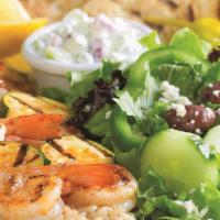 Shrimp Kabob Platter · Popular item. Grilled shrimp kabob platter served with rice, pita bread and one side of your...