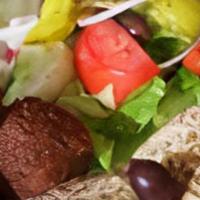 Falafel Platter · Vegetarian. Falafel patties, turnips, tomato, lettuce, parsley, pickles, tahini sauce, serve...