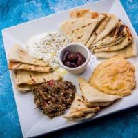 Trio Of Spreads · Pita bread w/ Hummus, Tzatziki & Meli Salad
