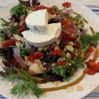 Manouri Mixed Green Salad · Mixed Greens, Cherry Tomatoes, Red Onions, Roasted Red Peppers, Almonds, Grilled Manouri che...