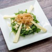 Arugula Salad · Arugula, Carmelized Onions, Almonds, Vlahotyri Cheese & Organic Honey Vinaigrette