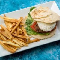 Lamburger · 8 oz. lamb burger topped w/ goat cheese, lettuce, tomatoes, onions, and served w/Greek fries.