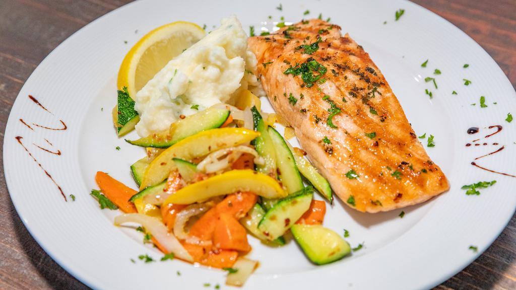 Salmon Alla Griglia · Fresh Norwegian salmon fillet grilled to perfection with vegetables.