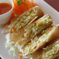 (L) Thai Egg Rolls · Deep fried vegetarian egg rolls served with Thai sweet and sour sauce.