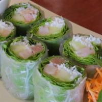 (L) Fresh Basil Rolls · A combination of roasted pork, shrimp, cucumber, cilantro, basil leaves, and green leaves wr...