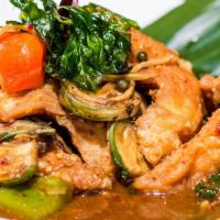 Spicy Catfish · Deep fried then sautéed fillets of wild catfish with Thai eggplant, bell peppers, green pepp...