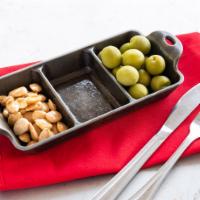 Aceitunas Y Almendras · Castaveltrano Olives with Lemon Infused Olive Oil, Marcona Almonds