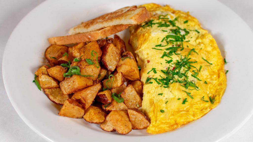 Ham & Cheese Omelet W. Hash Browns & Turkey Bacon · Toast comes with this breakfast meal.